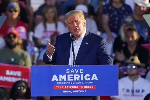 Former President Donald Trump speaks at a rally, Oct. 9, 2022, in Mesa, Ariz. Trump has been teasing another presidential run since before he left the White House. But aides to the former president are now preparing for a 2024 campaign that could be announced soon after next week's midterms. (AP Photo/Matt York, File)
