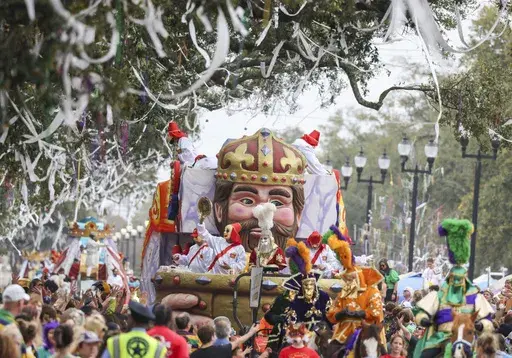 The captain rides on a float with moving eyes and mouth as the Krewe of Mid-City parades on the Uptown route in New Orleans, Feb. 11, 2024. (Sophia Germer/The Times-Picayune/The New Orleans Advocate via AP, File)