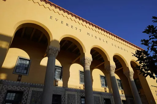An entryway to Everett Middle School is seen Wednesday, June 22, 2022, in San Francisco. The first week of school was supposed to mark a triumphant return to classrooms at Everett after more than a year of distance learning. But as computer science teacher Yesi Castro-Mitchell welcomed a class of sixth graders last fall, she says a student started punching her, again and again. Across America one of the most difficult academic years in modern history was also one of the most violent, educators a