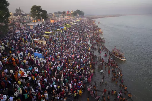 Thousands of Hindu devotees take a holy dip on the occasion of Ramnavi festival, celebrated as the birthday of Hindu God Rama, in Ayodhya, India, Thursday, March 30, 2023. India is on track to become the world's most populous nation, surpassing China by 2.9 million people by mid-2023, according to data released by the United Nations on Wednesday. The South Asian country will have an estimated 1.4286 billion people against China's 1.4257 billion by the middle of the year, according to U.N. projec