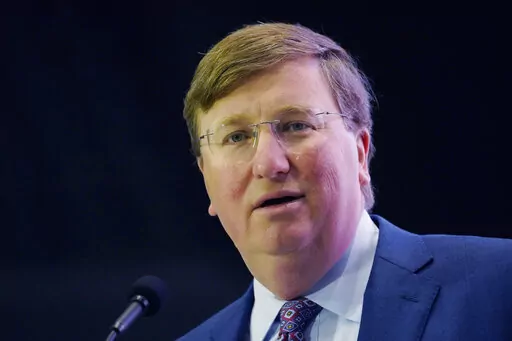 Mississippi Gov. Tate Reeves addresses business leaders at the Mississippi Economic Council's annual "Hobnob Mississippi" in Jackson, Miss., Thursday, Oct. 27, 2022. Reeves expressed a desire for the elimination of the state's income tax during his address. (AP Photo/Rogelio V. Solis)