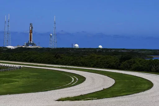 The NASA moon rocket stands on Pad 39B before the Artemis 1 mission to orbit the moon at the Kennedy Space Center, Thursday, Sept. 1, 2022, in Cape Canaveral, Fla. (AP Photo/Brynn Anderson)