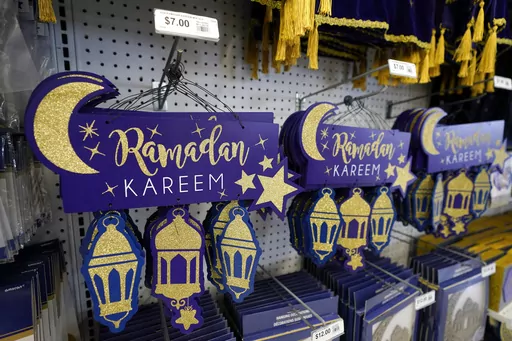 Ramadan decorations are displayed at a Party City store in Dearborn, Mich., on Thursday, March 23, 2023. More businesses are selling Ramadan and Eid items, including DIY kits, lanterns and napkin holders. It's one of the latest signs of big U.S. retailers catering to American Muslim shoppers. Many Muslim Americans enthusiastically welcomed the recognition, applauding those retailers that are making it easier for them to bring their families the cheer that ubiquitously and publicly marks some oth