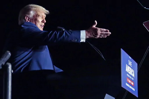 Former President Donald Trump speaks at a rally, Friday, Sept. 23, 2022, in Wilmington, N.C. On Monday, Oct. 24, 2022, Trump’s company goes on trial in a criminal tax case and the first task facing the court is a big one: Picking a neutral jury. (AP Photo/Chris Seward, File)