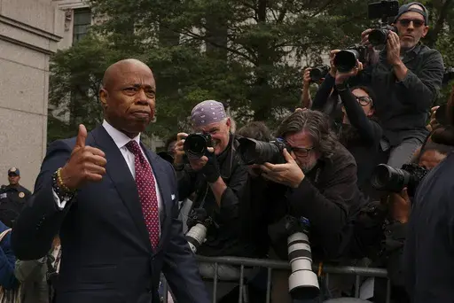 New York City mayor Eric Adams departs Manhattan federal court after an appearance, Friday, Sept. 27, 2024, in New York. (AP Photo/Yuki Iwamura, File)