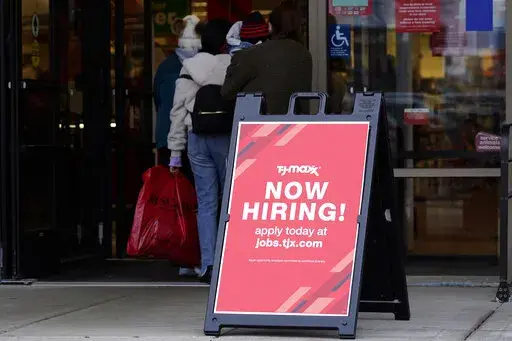 Hiring sign is displayed outside of a retail store in Vernon Hills, Ill., Saturday, Nov. 13, 2021. Labor Department releases weekly report on unemployment benefits on Thursday, Dec. 1, 2022. On Thursday the Labor Department reports on the number of people who applied for unemployment benefits last week. (AP Photo/Nam Y. Huh, File)
