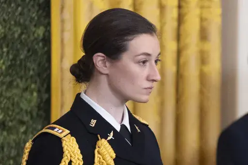 Army Capt. Rebecca M. Lobach, of Durham, N.C., is pictured during the Presidential Medal of Freedom ceremony in the East Room of the White House, Jan. 4, 2025, in Washington. (AP Photo/Manuel Balce Ceneta, File)
