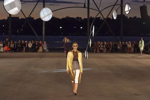Fashion from the Tory Burch collection is modeled during Fashion Week on Tuesday, Sept. 13, 2022, in New York. (AP Photo/Andres Kudacki)