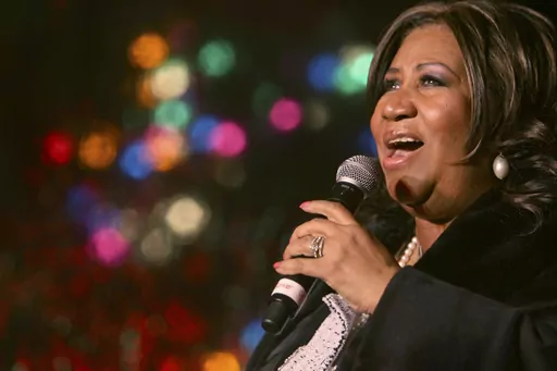 In this Dec. 4, 2008 file photo, Aretha Franklin performs during the 85th annual Christmas tree lighting at the New York Stock Exchange in New York. In a decision made Monday, Nov. 28, 2023, Judge Jennifer Callaghan who overseeing the estate of Aretha Franklin assigned real estate to the late music superstar's sons, saying she was following the wishes of a 2014 handwritten will that was found in couch cushions. (AP Photo/Mary Altaffer, File)