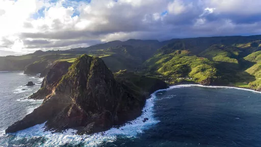 This photo provided by Kawena Alo-Kaonohi shows a view looking down into Kahakuloa village in Wailuku, Hawaii, Jan. 18, 2020. Two Native Hawaiian men are scheduled to be sentenced Thursday, March 2, 2023, for a federal hate crime in the 2014 brutal beating of a white man who tried to move into their remote, traditional fishing village. (Courtesy of Kawena Alo-Kaonohi via AP)