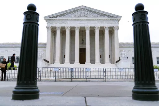 The U.S. Supreme Court is seen early Tuesday, May 3, 2022 in Washington. A draft opinion suggests the U.S. Supreme Court could be poised to overturn the landmark 1973 Roe v. Wade case that legalized abortion nationwide, according to a Politico report released Monday. Whatever the outcome, the Politico report represents an extremely rare breach of the court's secretive deliberation process, and on a case of surpassing importance. (AP Photo/Jose Luis Magana)