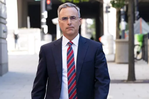 Pat Cipollone, former White House counsel under President Donald Trump, arrives at the federal courthouse in Washington, Friday, Sept. 2, 2022. (AP Photo/Jose Luis Magana)