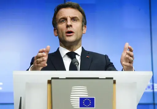 French President Emmanuel Macron speaks during a media conference after an extraordinary EU summit on Ukraine in Brussels, Feb. 25, 2022. Macron has formally announced he will run for a second term in April’s presidential election. In a “letter to the French” published Thursday, March 3 on French media websites, Macron said: “I am seeking your trust again."  (Olivier Hoslet, Pool Photo via AP, file)