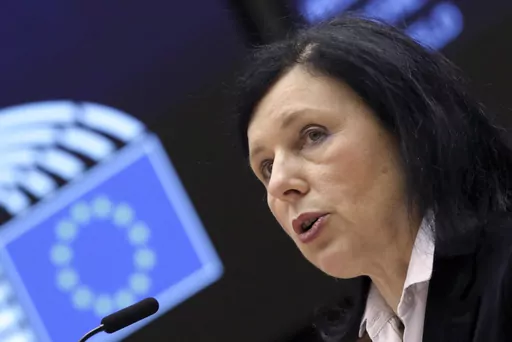 European Commissioner for Values and Transparency Vera Jourova addresses the plenary at the European Parliament in Brussels, Thursday, March 25, 2021. The European Union is pushing online platforms like Google and Meta to step up the fight against false information by adding labels to text, photos and other content generated by artificial intelligence, EU Commission Vice President Vera Jourova said Monday. (Yves Herman, Pool via AP, File)
