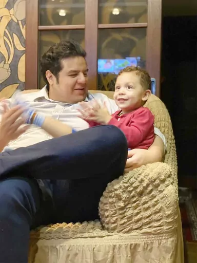 FILE -This 2021 photo provided by Angel Quintana shows Cesar Quintana, and Cesar's son, Alexander Quintana. Quintana is trying to find a way to get his son back to California but the boy is now in Russia with Quintana's estranged Ukrainian-American wife and her family after they escaped from the coastal Ukrainian city of Mariupol. (Angel Quintana via AP, File)