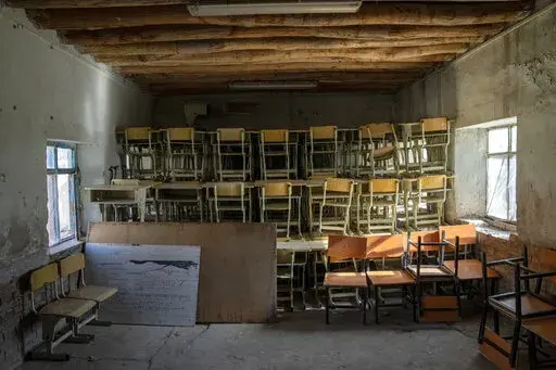 A classroom that previously was used for girls sits empty in Kabul, Afghanistan, Thursday, Dec. 22, 2022. The country's Taliban rulers earlier this week ordered women nationwide to stop attending private and public universities effective immediately and until further notice. They have banned girls from middle school and high school, barred women from most fields of employment and ordered them to wear head-to-toe clothing in public. Women are also banned from parks and gyms.(AP Photo/Ebrahim Noro