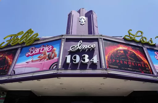 The marquee of the Los Feliz Theatre features the films "Barbie" and "Oppenheimer," Friday, July 28, 2023, in Los Angeles. Both films were blockbusters in 2023. (AP Photo/Chris Pizzello, File