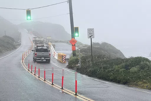 In this provided by the California Department of Transportation, a section of Highway 1 re-opened, Friday, May 17, 2024, in Big Sur, Calif., after repairs were made following storm damage. (Kevin Drabinski/California Department of Transportation via AP)