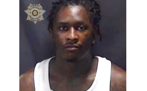 CORRECT FIRST NAME TO: JEFFERY, INSTEAD OF JEFFREY This booking photo provided by Fulton County Sheriff’s Office shows a booking photo of Atlanta rapper Young Thug.  The Atlanta rapper, whose name is Jeffery Lamar Williams, was one of 28 people indicted Monday, May 9, 2022, in Georgia on conspiracy to violate the state's RICO act and street gang charges, according to jail records.   (Fulton County Sheriff’s Office via AP)