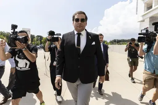Former U.S. Rep. George Santos arrives at court in Central Islip, N.Y., Monday, Aug. 19, 2024. (AP Photo/Stefan Jeremiah, File)