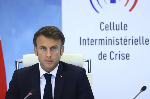 French President Emmanuel Macron speaks following a government emergency meeting after riots erupted for the third night in a row across the country, at the Interior Ministry in Paris, Friday, June 30, 2023. After six years in power, French President Emmanuel Macron appears further weakened by days of rioting over the death of a teen killed by police that come on top of a series of other challenges at home, leading domestic politics to impede his influence abroad. Macron was forced to delay his 