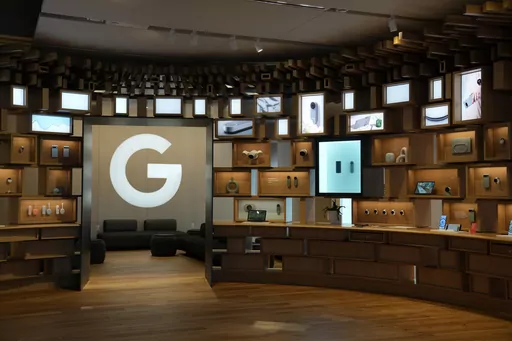 Items are displayed in the Google Store at the Google Visitor Experience in Mountain View, Calif., Oct. 11, 2023. The Justice Department says a former software engineer at Google has been charged with stealing artificial intelligence technology from the company while secretly working with two companies based in China. Linwei Ding was arrested in Newark, California., on four counts of federal trade secret theft.(AP Photo/Eric Risberg, File)