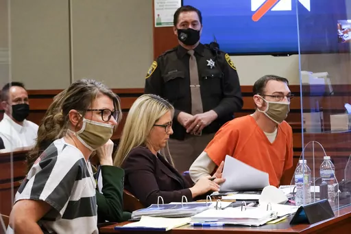 Jennifer Crumbley, left, and James Crumbley, right, the parents of Ethan Crumbley, a teenager accused of killing four students in a shooting at Oxford High School in Oxford, Mich., appear in court for a preliminary examination on involuntary manslaughter charges in Rochester Hills, Mich., Feb. 8, 2022. Jennifer and James Crumbley can face trial for involuntary manslaughter, the state appeals court said Thursday, March 23, 2023, in a groundbreaking case of criminal responsibility for the acts of 