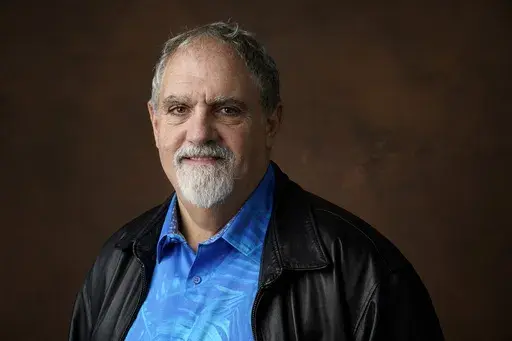 Jon Landau stands for a portrait at the 95th Academy Awards Nominees Luncheon, Feb. 13, 2023, at the Beverly Hilton Hotel in Beverly Hills, Calif. Landau, an Oscar-winning producer who worked closely with director James Cameron on “Titanic" and the “Avatar” series, has died, announced in a statement Saturday, July 6, 2024. (AP Photo/Chris Pizzello, File)