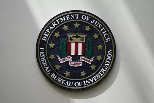 An FBI seal is seen on a wall on Aug. 10, 2022, in Omaha, Neb. The House was holding a key test vote Wednesday, April 10, 2024, on whether to consider a bill that would reauthorize a crucial national security surveillance program, but the prospects were uncertain amid intense Republican opposition as well as an edict earlier in the day from former President Donald Trump to “kill" the measure. Johnson has called the program “critically important” but has struggled to find a path forward on 