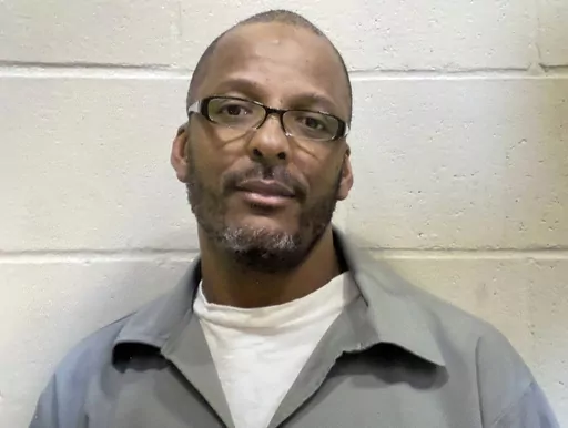 This photo provided by Kira Dunn shows Christopher Dunn. St. Louis' top prosecutor has asked a court to set aside the conviction of the man who has spent 33 years in prison for a killing he says he didn't commit, after witnesses who testified against him later said authorities had pressured them to lie. In her request to overturn Dunn's first-degree murder conviction, St. Louis Circuit Attorney Kim Gardner cited “clear and convincing evidence” that he had not been involved in the 1990 shooti
