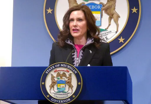Michigan Gov. Gretchen Whitmer speaks at a news conference on Friday, March 11, 2022, at the governor's office in Lansing, Mich. A judge on Tuesday, MAY 17, 2022, suspended Michigan's dormant, decades-old ban on abortion, which means the procedure would not be illegal in the state even if the U.S. Supreme Court overturned its historic Roe v. Wade decision. (AP Photo/David Eggert, File)