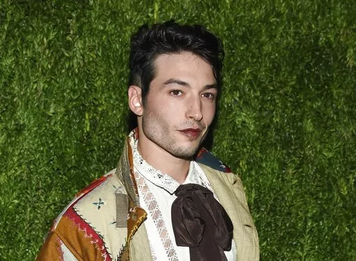 Ezra Miller attends the 15th annual CFDA/Vogue Fashion Fund event at the Brooklyn Navy Yard in New York on Nov. 5, 2018. Miller, known for playing "The Flash" in "Justice League" films, has reached a plea agreement with Vermont prosecutors in which they will plead guilty to an unlawful trespass charge that they broke into a home and stole three bottles of liquor. (Photo by Evan Agostini/Invision/AP, File)