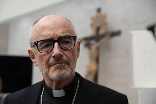 Cardinal Michael Czerny meets with journalists at the Vatican press hall, in Rome, on March 30, 2023. (AP Photo/Gregorio Borgia, File)