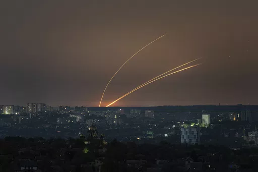 Russian rockets are launched against Ukraine from Russia's Belgorod region, seen from Kharkiv, Ukraine, on Thursday, April 18, 2024. (AP Photo/Evgeniy Maloletka)