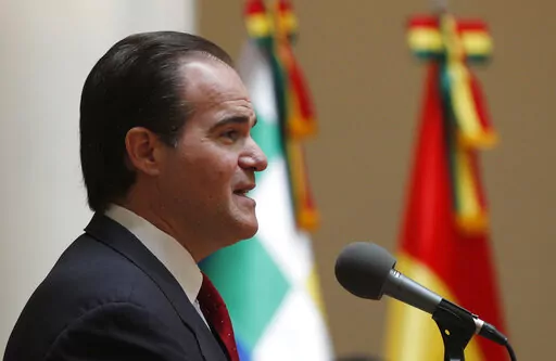 FILE – Inter-American Development Bank, IDB, President Mauricio Claver-Carone, speaks to the press in La Paz, Bolivia, Jan. 15, 2020.  An investigation into the former Trump official who heads Latin America’s biggest development bank found evidence that he carried on a romantic relationship with his chief of staff.  The Associated Press obtained a confidential report by a law firm hired by the Inter-American Development Bank’s board triggered by an anonymous complaint of misconduct against