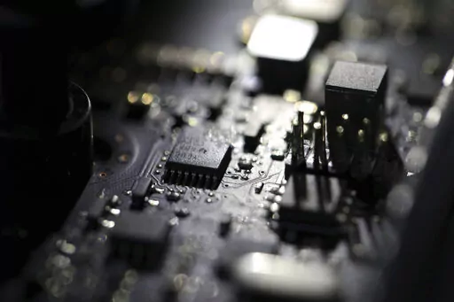 This Feb 23, 2019, photo shows the inside of a computer. A key part of President Joe Biden's plans to fight major ransomware attacks and digital espionage campaigns has been languishing for more than eight months.(AP Photo/Jenny Kane, File)
