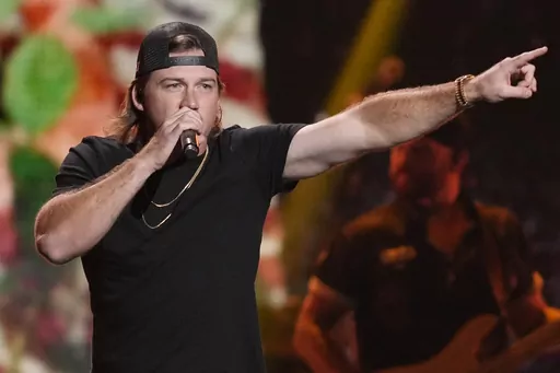 Morgan Wallen performs on the first night of the 2022 iHeartRadio Music Festival, on Sept. 23, 2022, in Las Vegas. Thousands of country music fans were awaiting the singer when he suddenly canceled his performance Sunday night, April 23, 2023, at Vaught Hemingway Stadium. WTVA-TV reported that video boards inside the Ole Miss football stadium showed a message that said the singer had lost his voice and was unable to perform, adding that people would be refunded their money where they bought thei