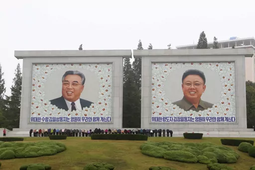 Citizens visit the portraits of the country's late leaders Kim Il Sung and Kim Jong Il on the occasion of the 78th founding anniversary of the Worker's Party of Korea in Pyongyang, North Korea, Oct. 10, 2023. The White House says that North Korea has delivered more than 1,000 containers of military equipment and munitions to Russia for its ongoing war in Ukraine. White House National Security Council spokesman John Kirby said Friday the U.S. believes Kim is seeking sophisticated Russian weapons 