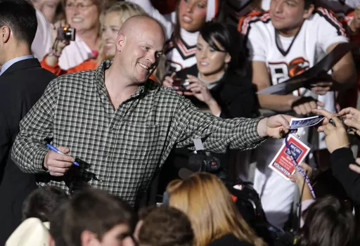 Joe Wurzelbacher, also known as "Joe the Plumber," signs autographs after appearing at a rally with Republican vice presidential candidate, Alaska Gov. Sarah Palin, at Bowling Green University in Bowling Green, Ohio, Oct. 29, 2008. Wurzelbacher, who was thrust into the political spotlight as “Joe the Plumber” after questioning Barack Obama about his economic policies during the 2008 presidential campaign, has died, his son said Monday, Aug. 28, 2023. He was 49. His oldest son, Joey Wurzelbac