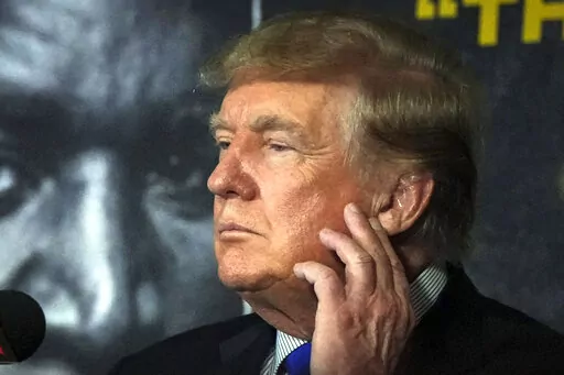 Former President Donald Trump prepares to provide commentary for a boxing event on Sept. 11, 2021, in Hollywood, Fla. Donald Trump and two of his children, Donald Jr. and Ivanka Trump are due, in the coming days, to face questioning under oath in New York's civil investigation into their business practices. But will the Trumps answer? (AP Photo/Rebecca Blackwell, File)