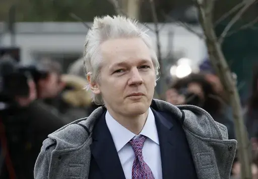 WikiLeaks founder Julian Assange arrivies at Belmarsh Magistrates' Court in London, Feb. 7, 2011. Assange will plead guilty to a felony charge in a deal with the U.S. Justice Department that will free him from prison and resolve a long-running legal saga over the publication of a trove of classified documents. (AP Photo/Kirsty Wigglesworth, files)