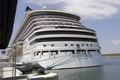 The Carnival cruise line ship Carnival Magic sits docked on April, 2020, in Cape Canaveral, Fla. The U.S. Coast Guard said Tuesday, May 30, 2023, that it's searching for a man who fell from a cruise ship off the coast of Florida. The 35-year-old was on the Carnival Magic when he fell from the ship about 186 miles east of Jacksonville, Fla., on Monday, May 29. (AP Photo/John Raoux, File)