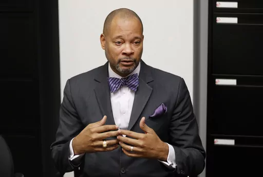 Nevada Attorney General Aaron Ford gestures during an interview in Las Vegas, on Dec. 14, 2018. Attorney General Ford announced Wednesday, July 5, 2023 the state has reached a $285 million settlement with Walgreens regarding the pharmacy chain’s role in the opioid epidemic. (AP Photo/John Locher, File)