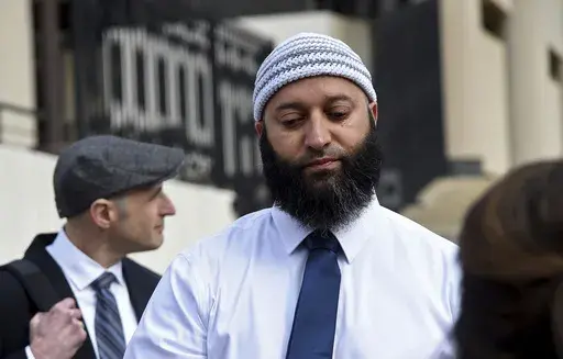 Adnan Syed gets emotional as he speaks to reporters outside the Robert C. Murphy Courts of Appeal building after a hearing, Feb. 2, 2023, in Annapolis, Md. (Barbara Haddock Taylor/The Baltimore Sun via AP, File)