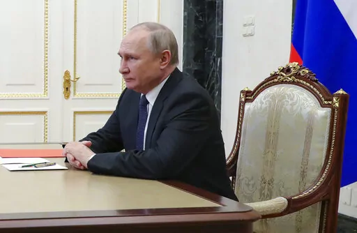 Russian President Vladimir Putin chairs a meeting with members of the Security Council via a video conference at the Kremlin in Moscow, Russia, April 29, 2022. The CIA says Russians disaffected by Vladimir Putin’s invasion of Ukraine may be trying to get in touch with U.S. intelligence. And it wants them to go to the darknet. The agency on Monday began a new push to promote its presence on a part of the internet accessible only through specialized tools that provide more anonymity. ( Mikhail K