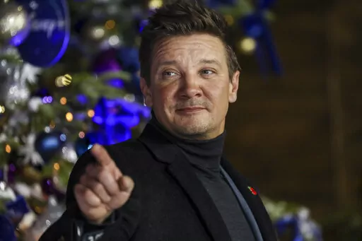 Jeremy Renner poses for photographers upon arrival at the UK Fan Screening of the film "Hawkeye," in London, Thursday, Nov. 11, 2021. Renner is being treated for serious injuries that happened while he was plowing snow. The actor's representative said Sunday, Jan. 1, 2023, that Renner is in critical condition although he is stable. (Photo by Vianney Le Caer/Invision/AP, File)