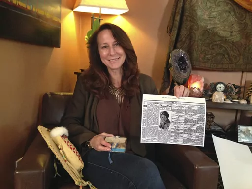 Betsy Roddy of Los Angeles holds a copy of the Aug. 17, 1910, edition of The River Press of Fort Benton, Mont., on June 12, 2017. The newspaper was one of the first to report on Father's Day, an event held for the first time in June of that year in Spokane, Wash., after Roddy's great-grandmother, Sonora Smart Dodd, lobbied local church and public officials for its creation. In the years that followed, Father's Day grew to become an international event and Dodd lived to see President Richard Nixo