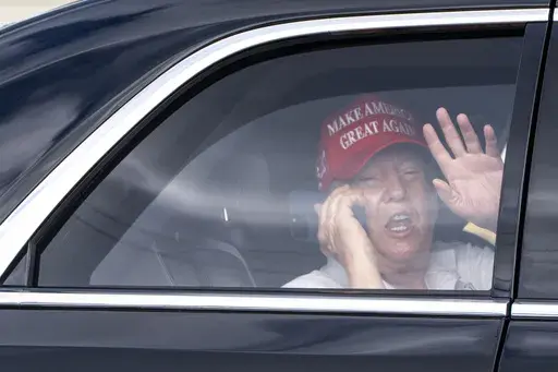 President Donald Trump waves as he arrives at the Trump International Golf Club, Friday, April 4, 2025, in West Palm Beach, Fla. (AP Photo/Alex Brandon)