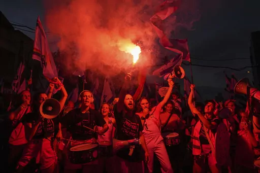 Israelis protest against plans by Prime Minister Benjamin Netanyahu's government to overhaul the judicial system, in Tel Aviv, Israel, Saturday, July 8, 2023. (AP Photo/Tsafrir Abayov)