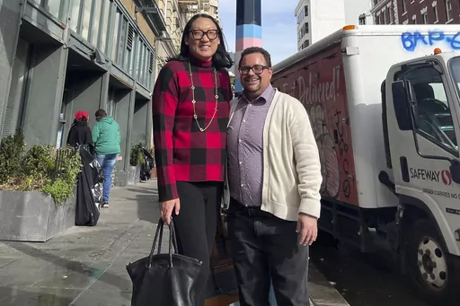 In this photo provided by the National Center for Transgender Equality, Andy Marra, left, the executive director of the Transgender Legal Defense and Education Fund, and Rodrigo Heng-Lehtinen, executive director of the National Center for Transgender Equality visit San Francisco's Transgender District in January 2023. In the summer of 2024, their organizations – two of the biggest transgender-rights groups in the U.S. – will merge into a new organization to be called Advocates for Trans Equa